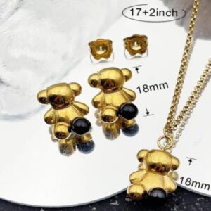 Conjunto de osito en relieve dorado